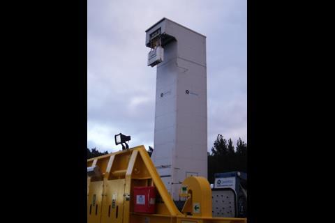 The Cavotec plug descends from its tower and connects automatically